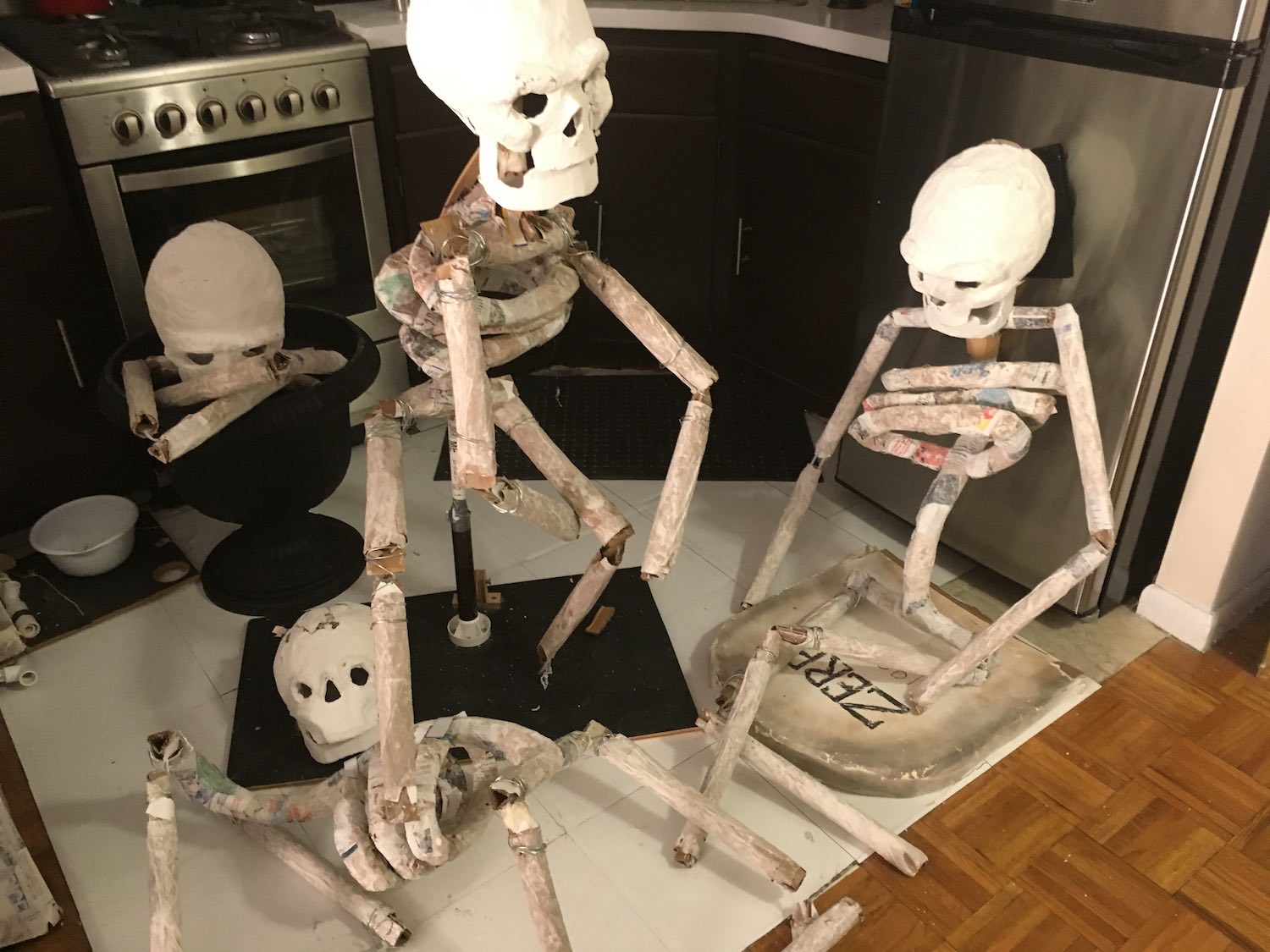 Four skeletons, in progress