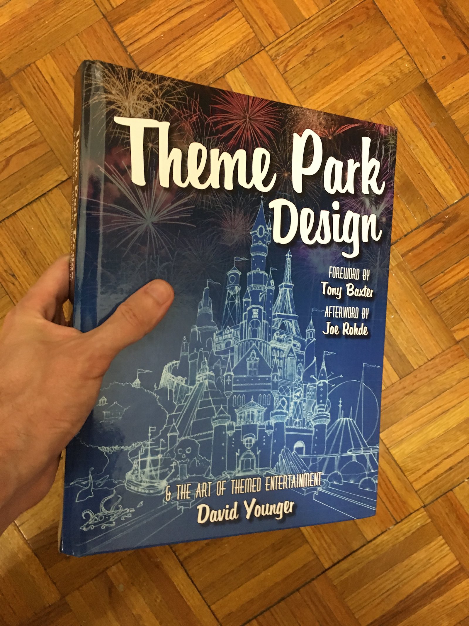 David Younger’s Theme Park Design, held in my hand. It’s huge.