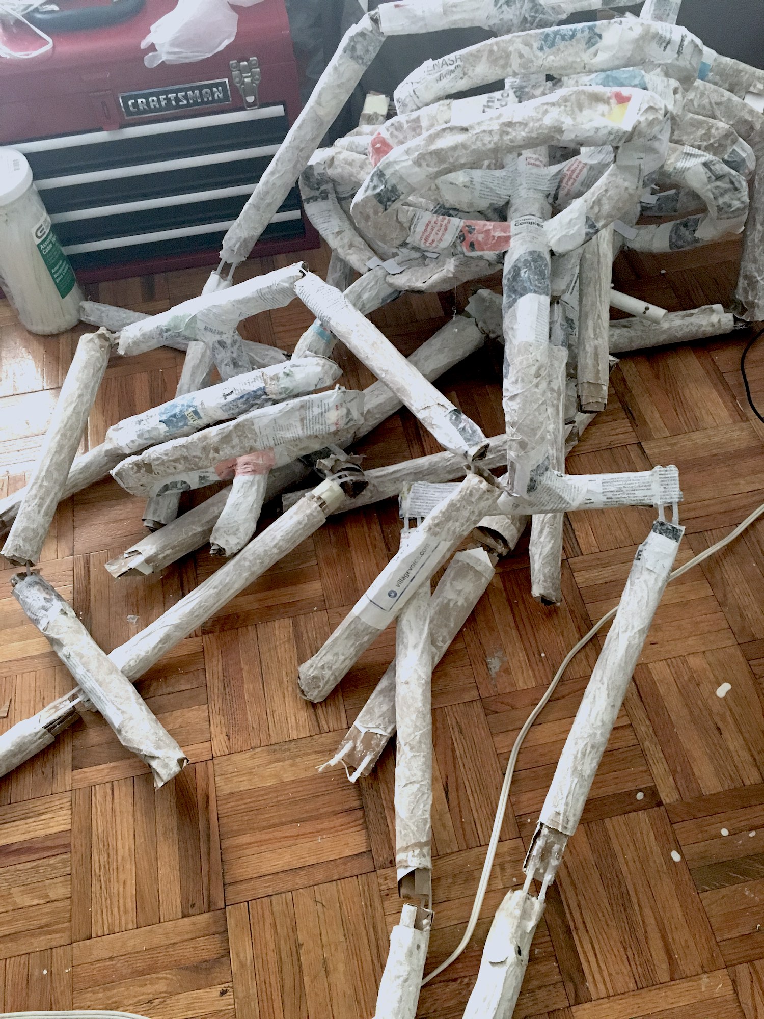 A pile of almost-finished skeleton sculptures