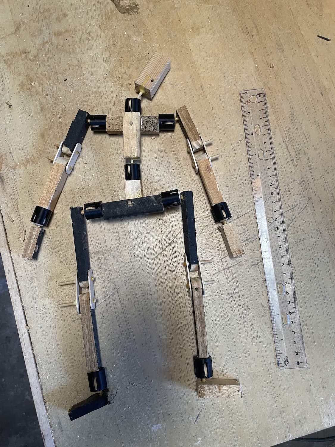 A wooden skeleton, so to speak, at the same scale as the paper figure from before.